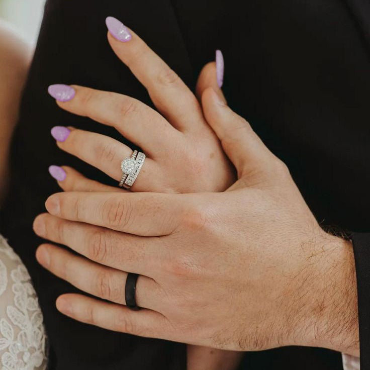 Bride and Groom Hand with Wedding Rings for him and her in Pittsburgh