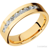 6 mm wide/Flat/14K Yellow Gold band with an  arrangement of 9, .07 carat Round Diamond stones in a Channel setting.