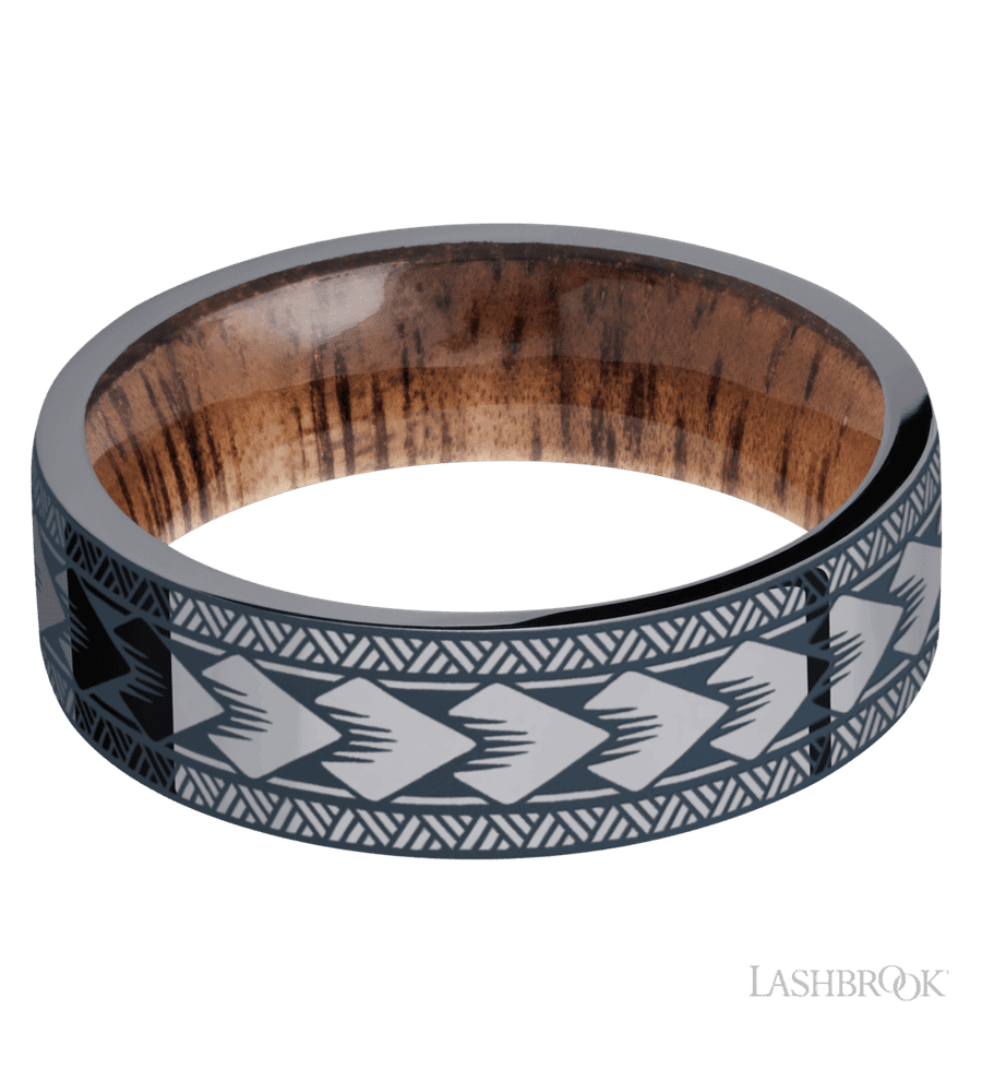 7 mm wide/Flat/Tantalum band with a laser carved Maori pattern also featuring a Koa sleeve.