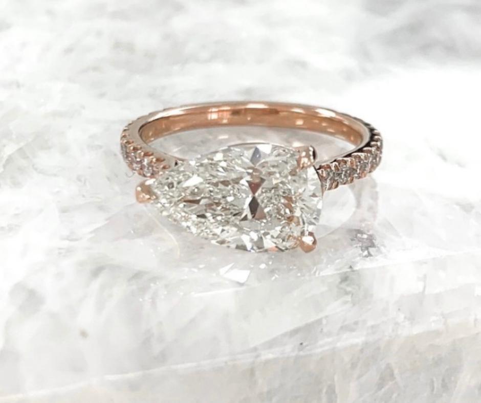 Rose Gold Engagement Ring with Large Pear Cut Diamond and pave setting