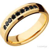 6 mm wide/Beveled/14K Yellow Gold band with an  arrangement of 9, .05 carat Round Black Diamond stones in a Bead Channel setting.