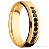 6 mm wide/Beveled/14K Yellow Gold band with an  arrangement of 9, .05 carat Round Black Diamond stones in a Bead Channel setting.
