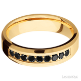 6 mm wide/Beveled/14K Yellow Gold band with an  arrangement of 9, .05 carat Round Black Diamond stones in a Bead Channel setting.