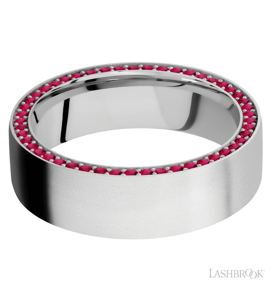 7 mm wide/Flat/14K White Gold band with a Side Eternity arrangement of .01 carat Round Ruby stones in a Bead Channel setting.