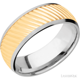 8 mm wide/Domed/14K White Gold band with one 6 mm Centered inlay of 14K Yellow Gold with a machined Ripple pattern.