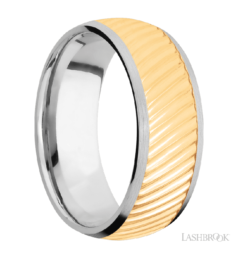 8 mm wide/Domed/14K White Gold band with one 6 mm Centered inlay of 14K Yellow Gold with a machined Ripple pattern.