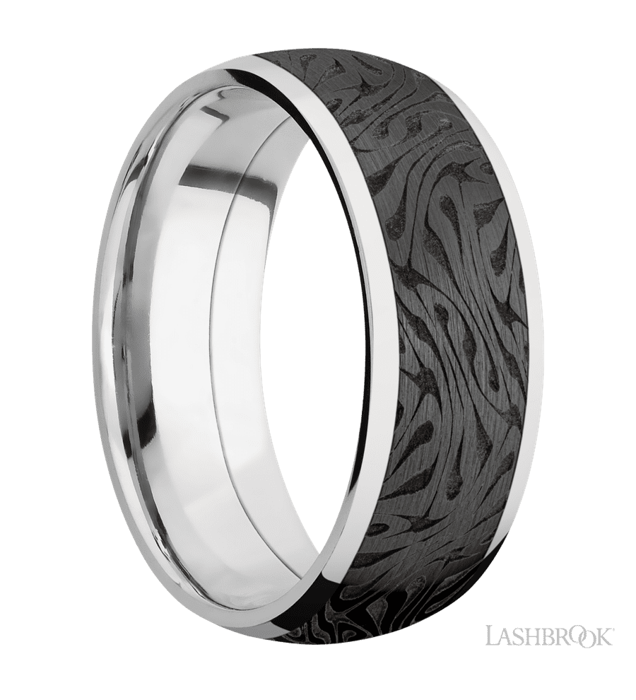 8 mm wide/Domed/Cobalt Chrome band with one 6 mm Centered inlay of Zirconium with a laser carved Escher 1 pattern.