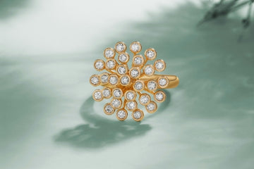 Custom Yellow Gold Fashion Ring Encrusted in Round Cut Diamonds in individual Bezel Settings