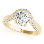 Top view of a round diamond ring in a cathedral prong setting with a euro pave shank in yellow gold