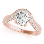 Top view of a round diamond ring in a cathedral prong setting with a euro pave shank in rose gold
