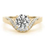Front view of a round diamond ring in a cathedral prong setting with a euro pave shank in yellow gold