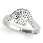 Top view of a round diamond ring in a cathedral prong setting with a euro pave shank in white gold