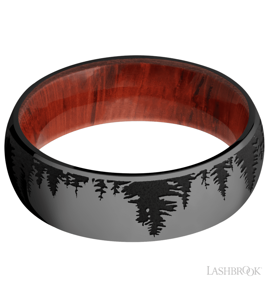 7 mm wide/Domed/Zirconium band with a laser carved Trees pattern also featuring a Padauk sleeve.