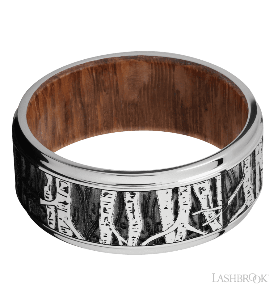 9 mm wide/Flat Grooved Edges/Cobalt Chrome band with a laser carved Aspen pattern also featuring a Leopard Wood sleeve.