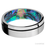 7 mm wide/Flat/14K White Gold band with one 0.5 mm Off Center inlay of Black also featuring a Abalone sleeve.