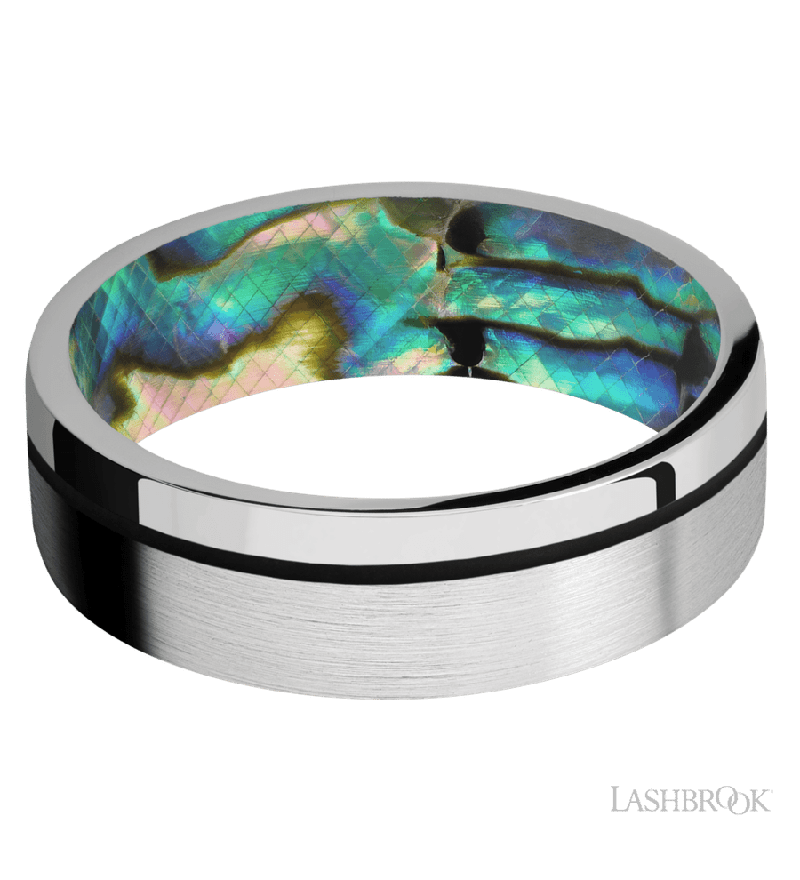 7 mm wide/Flat/14K White Gold band with one 0.5 mm Off Center inlay of Black also featuring a Abalone sleeve.