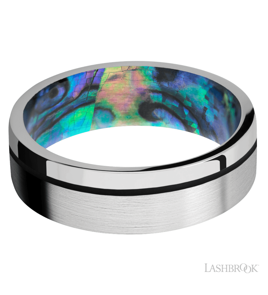 7 mm wide/Flat/14K White Gold band with one 0.5 mm Off Center inlay of Black also featuring a Abalone sleeve.