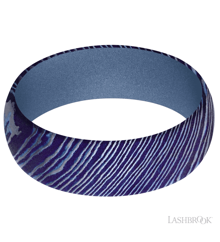 7 mm wide Domed Titanium Damascus band featuring a Crushed Orchid sleeve.