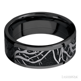 8 mm wide/Flat/Zirconium band with one 6 mm Centered inlay of Tantalum with a laser carved Branches pattern.