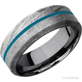 8 mm wide/High Bevel/Meteorite band with one 1 mm Centered inlay of Sea Blue also featuring a Tantalum sleeve.