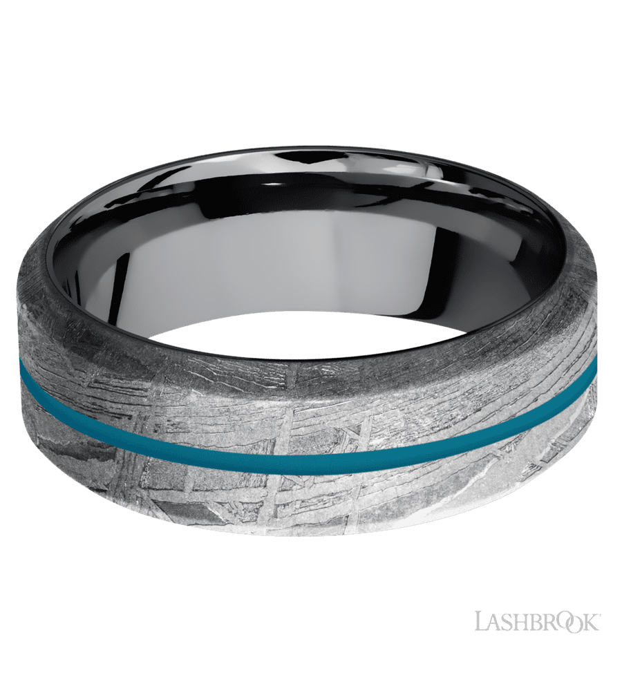 8 mm wide/High Bevel/Meteorite band with one 1 mm Centered inlay of Sea Blue also featuring a Tantalum sleeve.