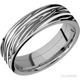7 mm wide/Flat/Titanium band with one 6 mm Centered inlay of Zirconium with a laser carved Zebra pattern.
