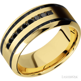 9 mm wide/High Bevel/14K Yellow Gold band with  two 1 mm Wide inlays of Black Onyx and featuring an  arrangement of 9, .03 carat Round Black Diamond stones in a Channel setting