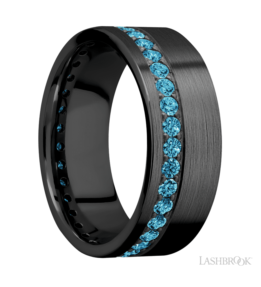 8 mm wide/Flat/Zirconium band with a Off Center Eternity arrangement of .03 carat Round Lab Blue Diamond stones in a Bead setting.