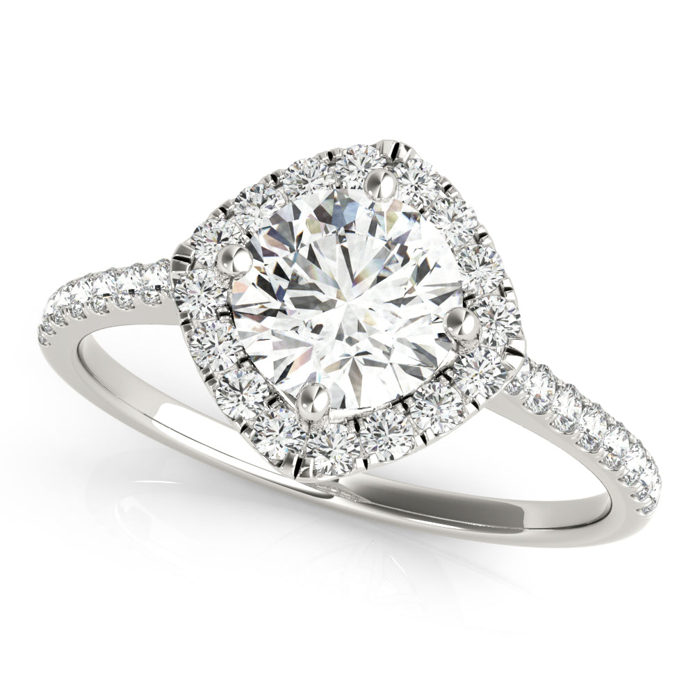 Top view of round center cushion halo ring in a cathedral prong setting with a single row pave shank in white gold