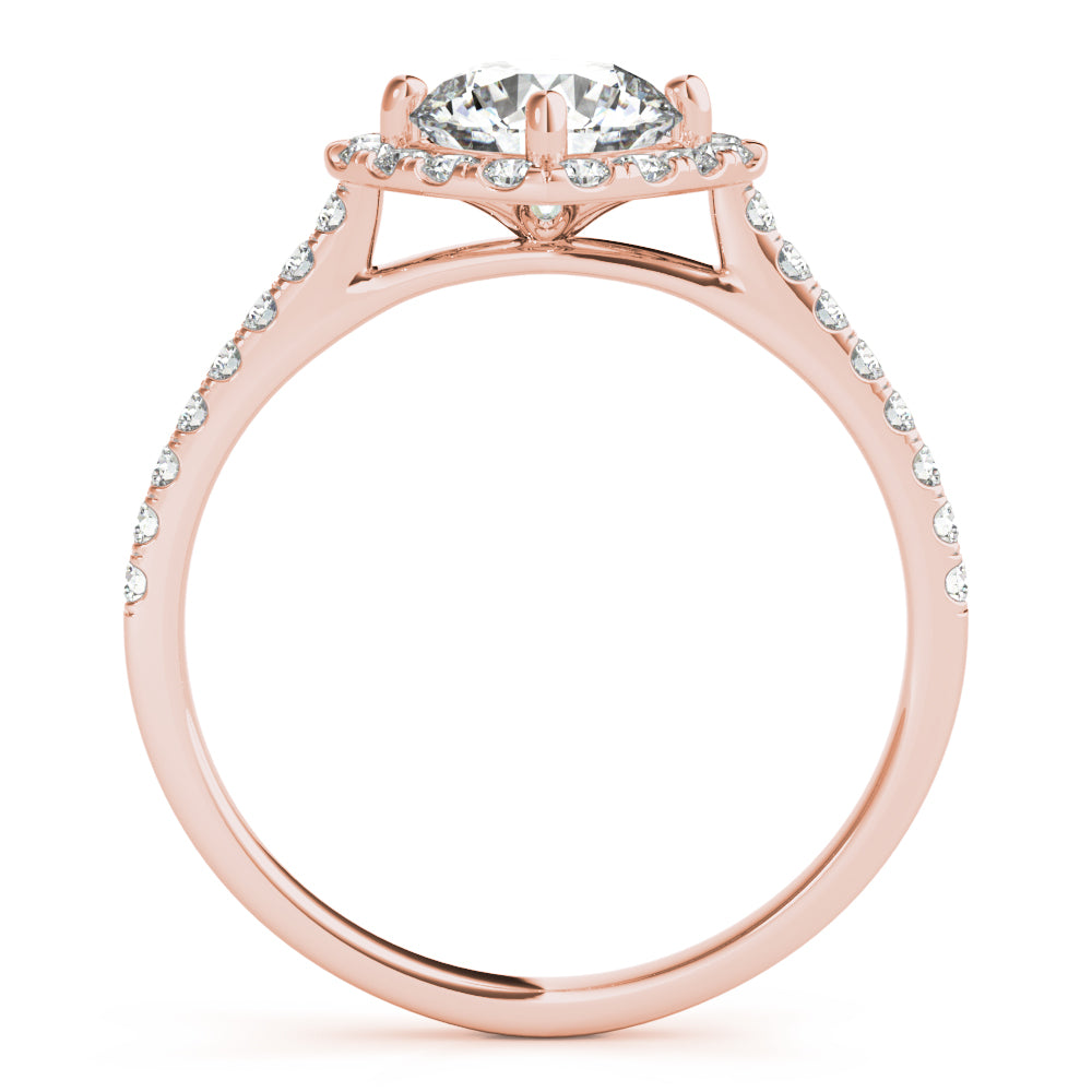 Side view of round center cushion halo ring in a cathedral prong setting with a single row pave shank in rose gold