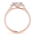 Side view of round center cushion halo ring in a cathedral prong setting with a single row pave shank in rose gold