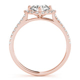Side view of round center cushion halo ring in a cathedral prong setting with a single row pave shank in rose gold