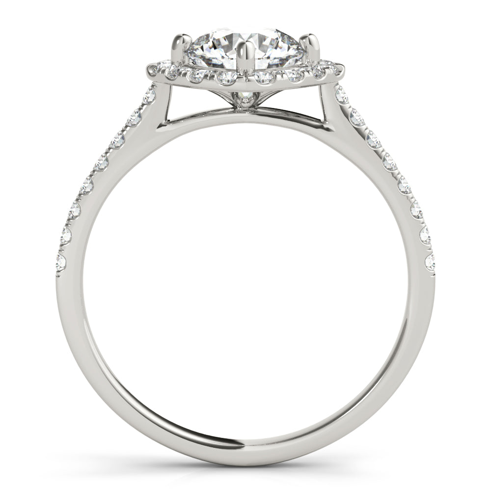 Side view of round center cushion halo ring in a cathedral prong setting with a single row pave shank in white gold