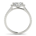 Side view of round center cushion halo ring in a cathedral prong setting with a single row pave shank in white gold