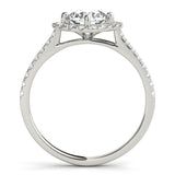 Side view of round center cushion halo ring in a cathedral prong setting with a single row pave shank in white gold