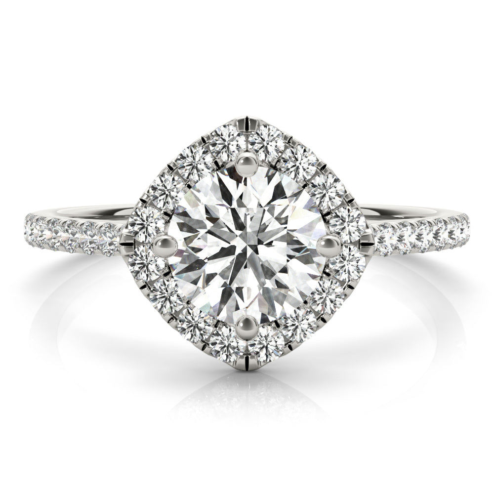 Front view of round center cushion halo ring in a cathedral prong setting with a single row pave shank in white gold