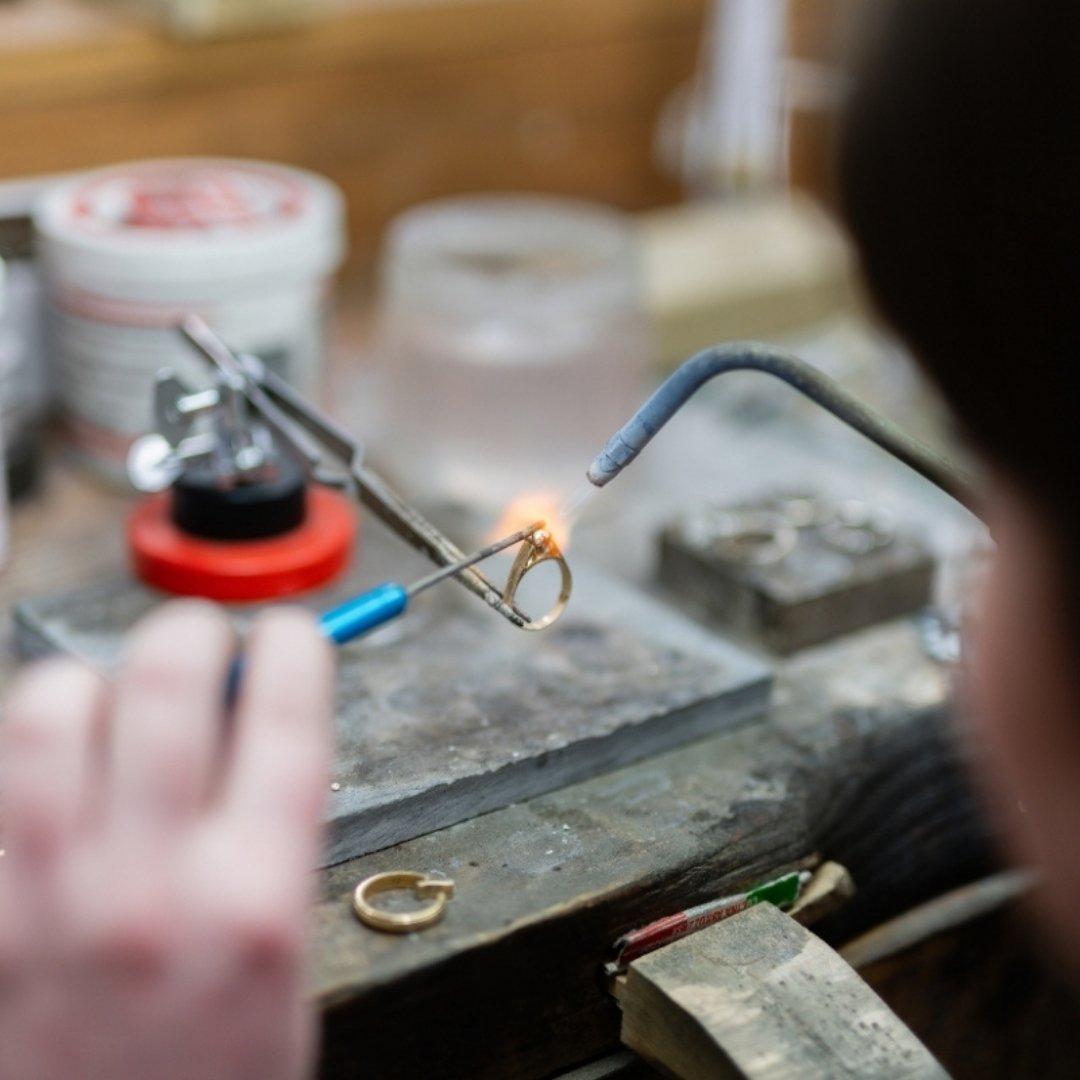 Bench Jeweler busy with a repair at Diamonds by Rothschild