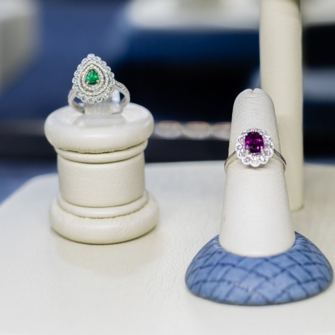 Vintage jewelry with green an purple center stones