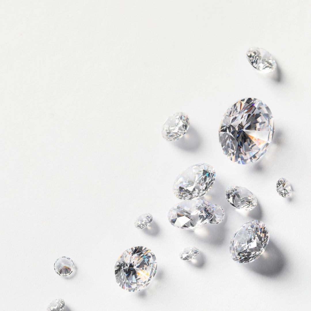 Loose Natural Round Diamonds arranged on a white background