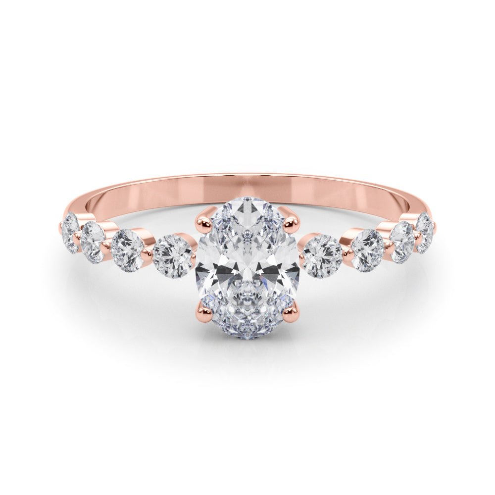 Oval Center Ring with Smaller Round Stones Along the Shank - Diamonds By Rothschild