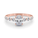 Oval Center Ring with Smaller Round Stones Along the Shank - Diamonds By Rothschild