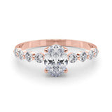 Oval Center Ring with Smaller Round Stones Along the Shank - Diamonds By Rothschild
