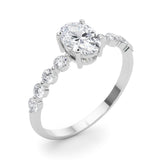 Oval Center Ring with Smaller Round Stones Along the Shank - Diamonds By Rothschild