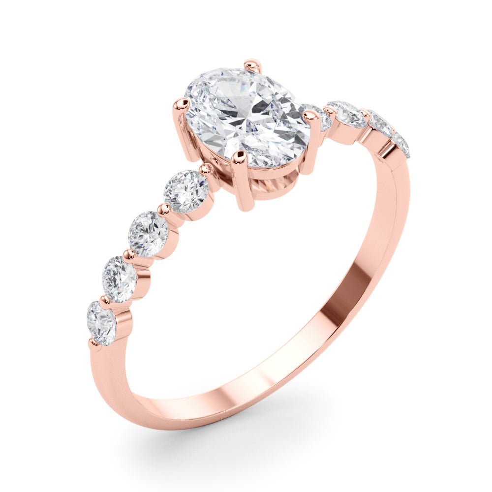 Oval Center Ring with Smaller Round Stones Along the Shank - Diamonds By Rothschild