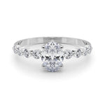 Oval Center Ring with Smaller Round Stones Along the Shank - Diamonds By Rothschild