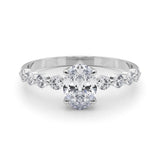 Oval Center Ring with Smaller Round Stones Along the Shank - Diamonds By Rothschild