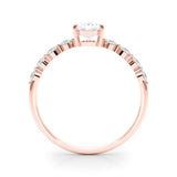 Oval Center Ring with Smaller Round Stones Along the Shank - Diamonds By Rothschild
