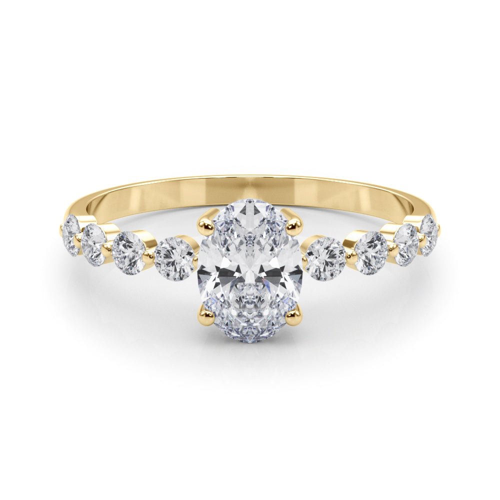 Oval Center Ring with Smaller Round Stones Along the Shank - Diamonds By Rothschild