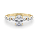 Oval Center Ring with Smaller Round Stones Along the Shank - Diamonds By Rothschild