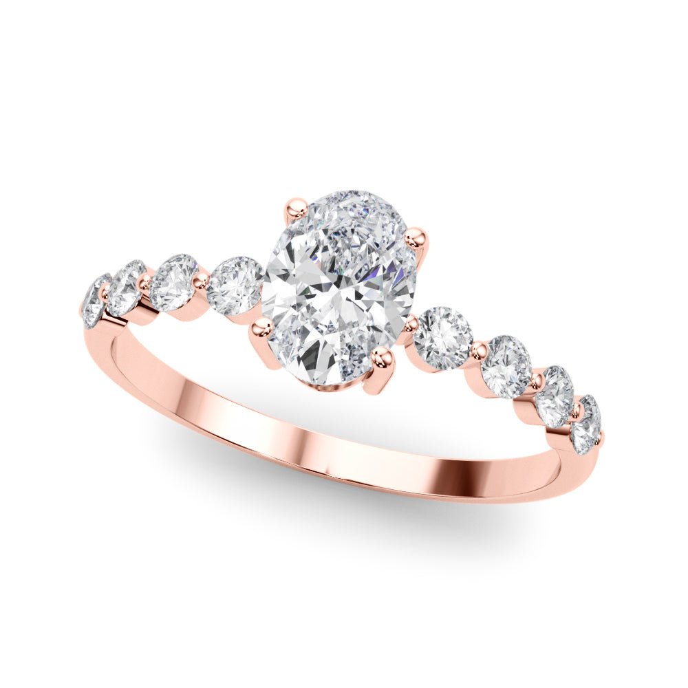 Oval Center Ring with Smaller Round Stones Along the Shank - Diamonds By Rothschild